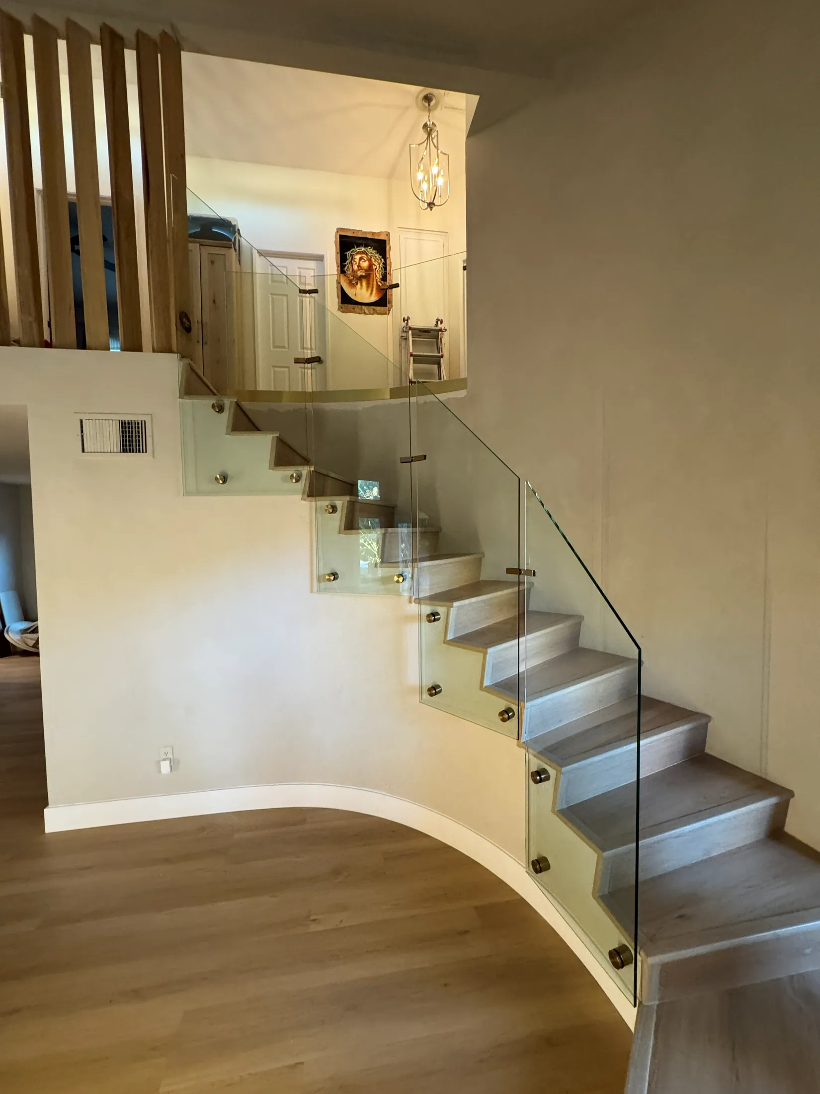 Curved glass stair railing
