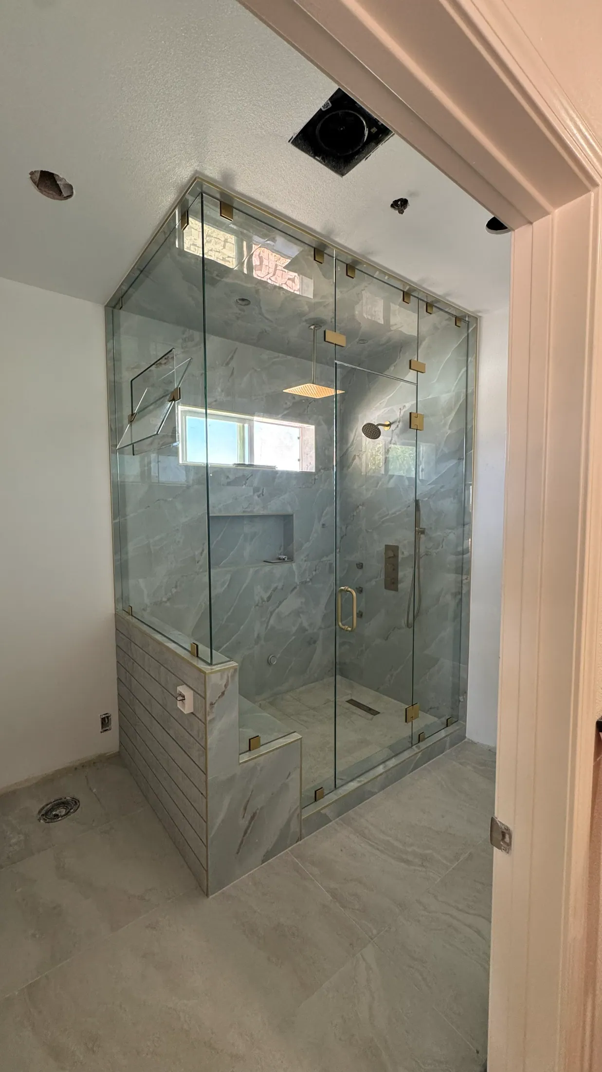Precision brass shower hardware and installation